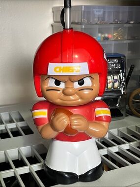 Red Football Player Coin Bank with Chiefs Decal